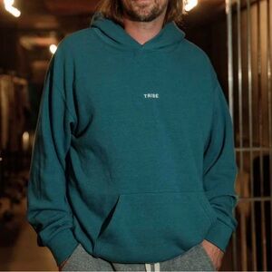 NEW TRIBE KELLEY
BUTTER HOODIE - VAULT UNISEX JEWEL